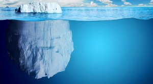 Half-submerged, large iceberg in Antractic Ocean.