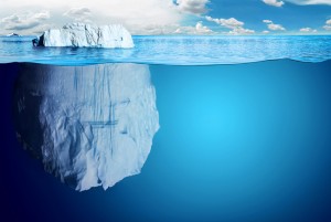 Half-submerged, large iceberg in Antractic Ocean.