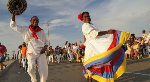 Latin dance at the parade with rhythmic steps and musical beats.