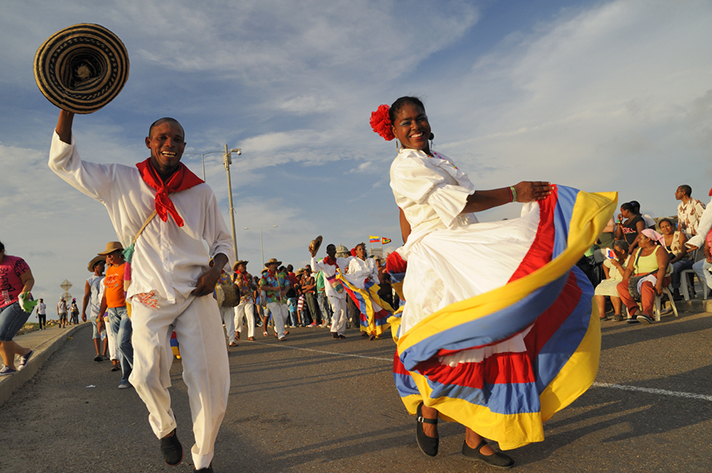 Latin dance at the parade with rhythmic steps and musical beats.